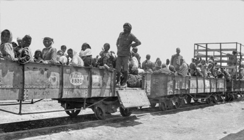 World War One photographs in Iraq (Mesopotamia). British Royal Engineers. The Bombay, Baroda and Central India Railway carriages with Armenian refugees and soldiers; Iraq Poster Print by John Short (21 x 12) World War One photographs in Iraq (Mesopotamia). British Royal Engineers. The Bombay, Baroda and Central India Railway carriages with Armenian refugees and soldiers; Iraq Poster Print by John Short (21 x 12)