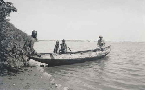 Negative early 20th century .Social History. British military in canoe with South African native Poster Print by John Short (21 x 13)