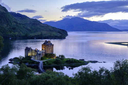 Eilean Donan Castle at sunset. Poster Print by Loop Images Ltd. (20 x 13)