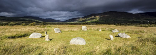 Neolithic standing stones at Machrie Moor dating from the Bronze Age. Poster Print by Loop Images Ltd. (27 x 9)