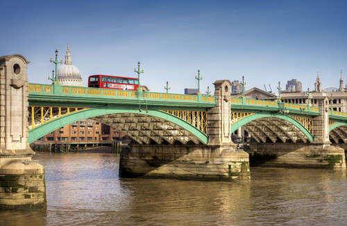 A bus travels over Southwark Bridge. Poster Print by Loop Images Ltd. (17 x 11)