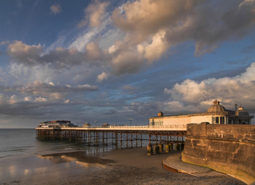 Cromer Pier in the early evening sun. Poster Print by Loop Images Ltd. (17 x 12)