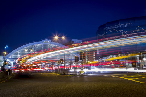 Traffic trails in front of Liverpool Lime street train station. Poster Print by Loop Images Ltd. (18 x 12)