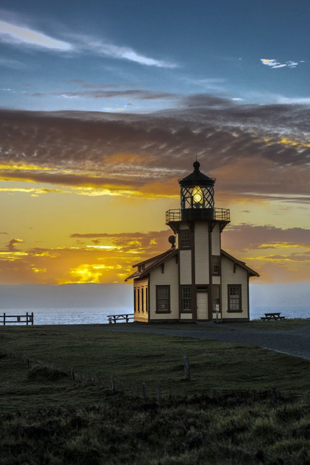 Point Cabrillo lighthouse in California at sunset. Poster Print by Loop Images Ltd. (13 x 20)