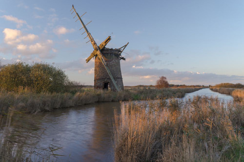 A view of Brograve Mill near Horsey in Norfolk. Poster Print by Loop Images Ltd. (17 x 11)