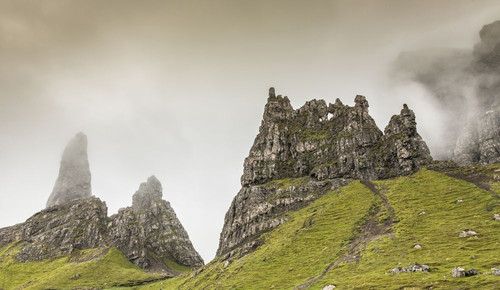 Misty Storr pinnacles on the Isle of Skye. Poster Print by Loop Images Ltd. (18 x 10)