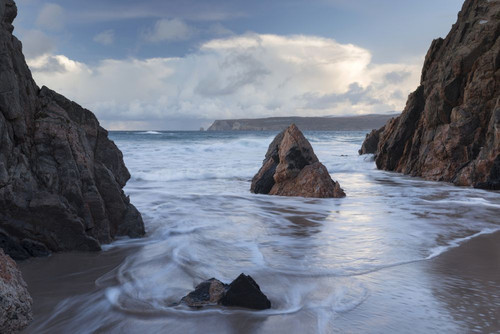 The rocky coast at Traigh nan H Umhaug. Poster Print by Loop Images Ltd. (19 x 13)