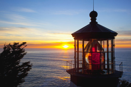 Sunset at Cape Meares Light on the Oregon coast; Oregon, United States of America Poster Print by Craig Tuttle (17 x 11)