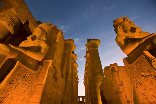 Ramses II Colossus at the entrance and central corridor of Luxor temple; Luxor, Egypt Poster Print by Michael Melford (17 x 11)