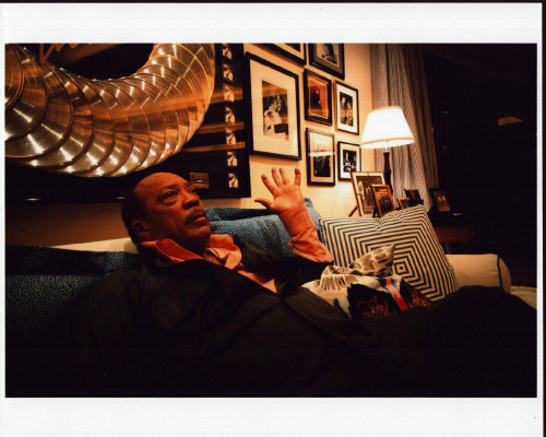 Quincy Jones Sitting On Couch With Hand Up Photo Print (8 x 10)