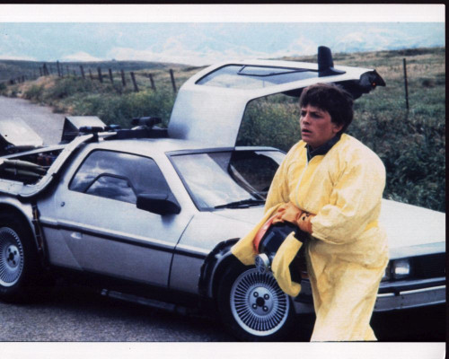 Michael J. Fox Next To Delorean In Back To The Future Photo Print (8 x 10)