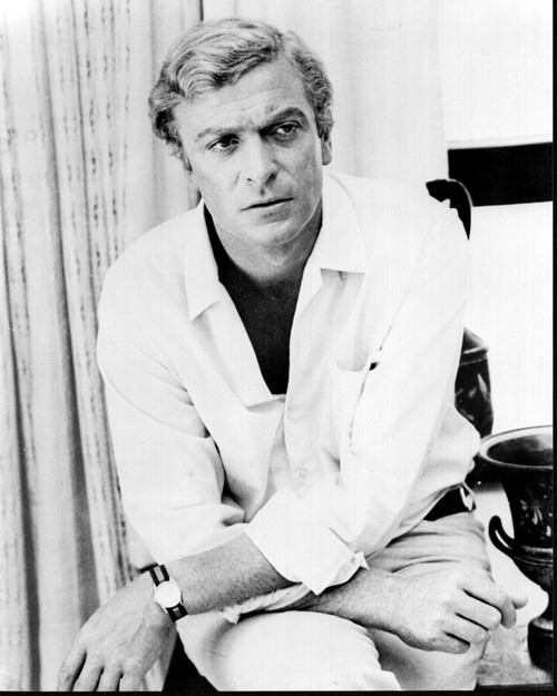 Michael Caine With Arms Crossed On Knee Black And White Photo Print