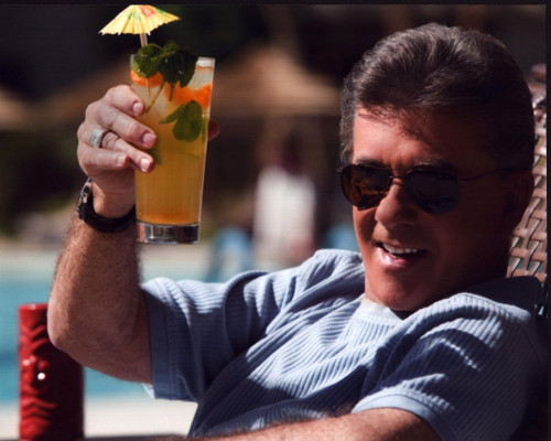 Alan Thicke Holding Tropical Drink Photo Print (8 x 10)
