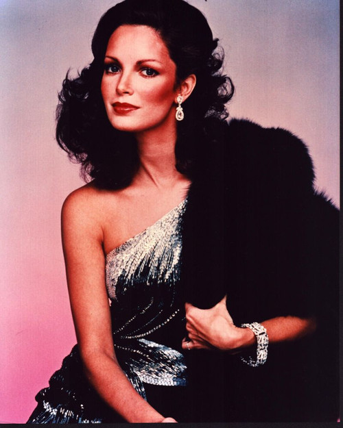 Jaclyn Smith In One Shoulder Silver And Black Dress With Black Black Fur Photo Print