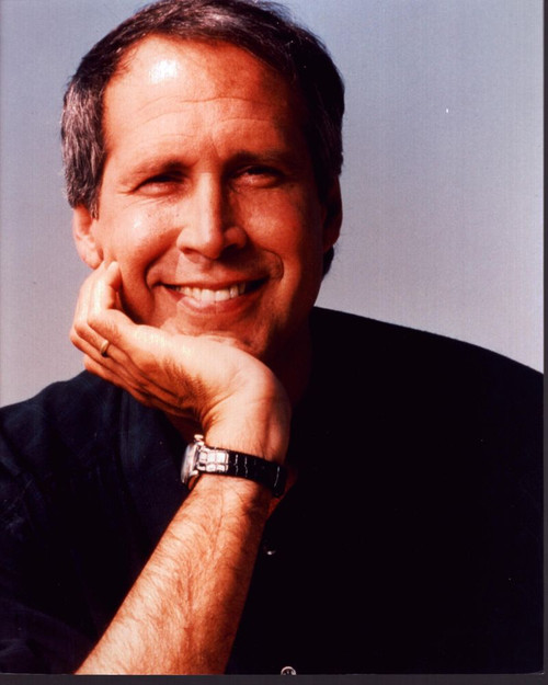 Chevy Chase Smiling With Head On Hand Photo Print (8 x 10)