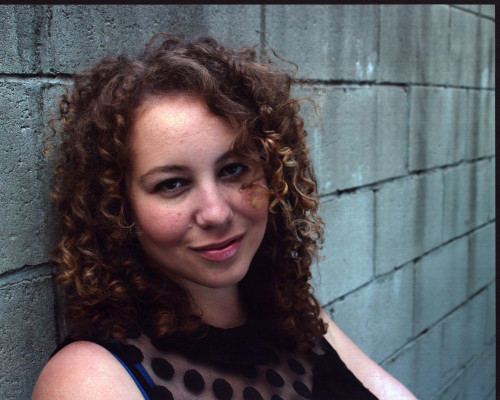 Anastasia Washington Leaning On Wall In Black Sheer Top Photo Print (8 x 10)