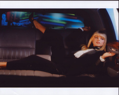 Donna D'Errico In Suit Laying In Back Seat Of Car Photo Print (8 x 10) Donna D'Errico In Suit Laying In Back Seat Of Car Photo Print (8 x 10)