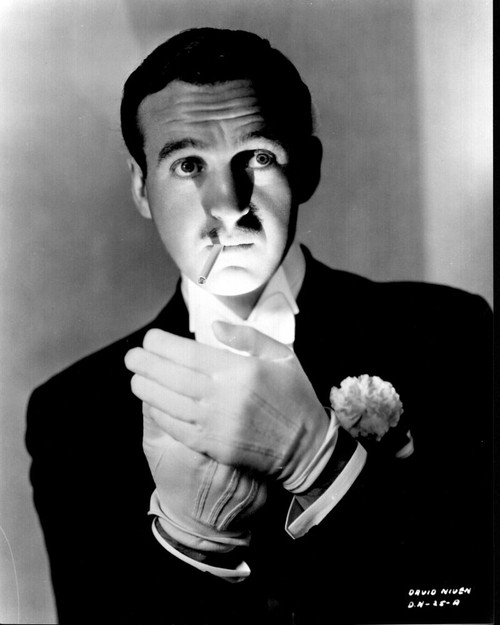 David Niven In Tuxedo With Gloves Lighting Cigarette Black And White Photo Print (8 x 10)