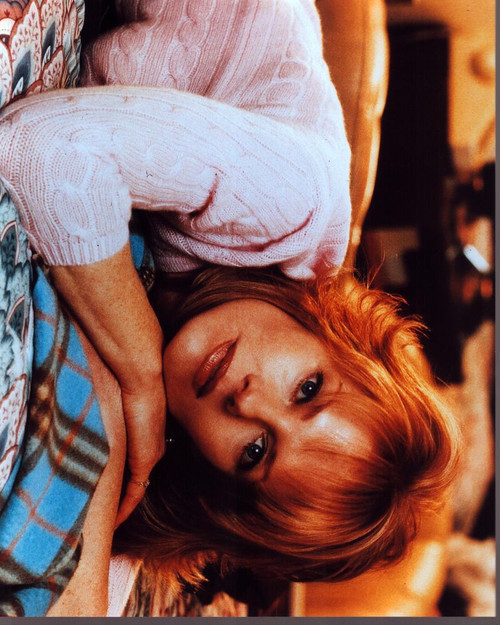 Marg Helgenberger Laying In Pink Sweater Photo Print (8 x 10)