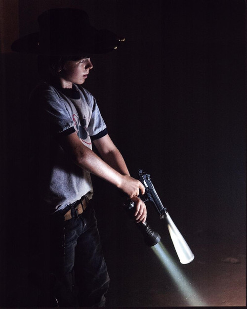 Chandler Riggs With Gun And Flashlight In The Walking Dead Photo Print