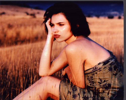 BéAtrice Dalle Sitting In Field Photo Print (8 x 10)