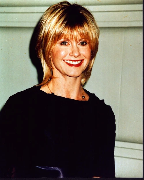 Olivia Newton-John Smiling In Black Top Photo Print