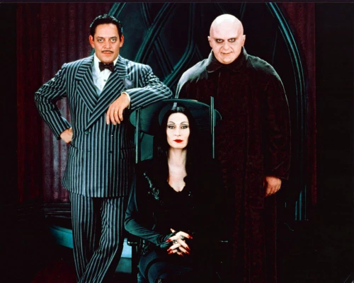 Raul Julia, Anjelica Huston And Uncle Fester Character For Addams Family Photo Print