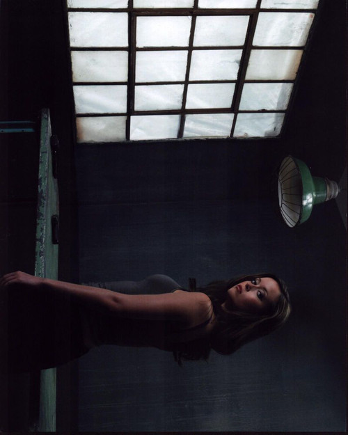 Summer Glau Next To Table With Guns Photo Print (8 x 10)