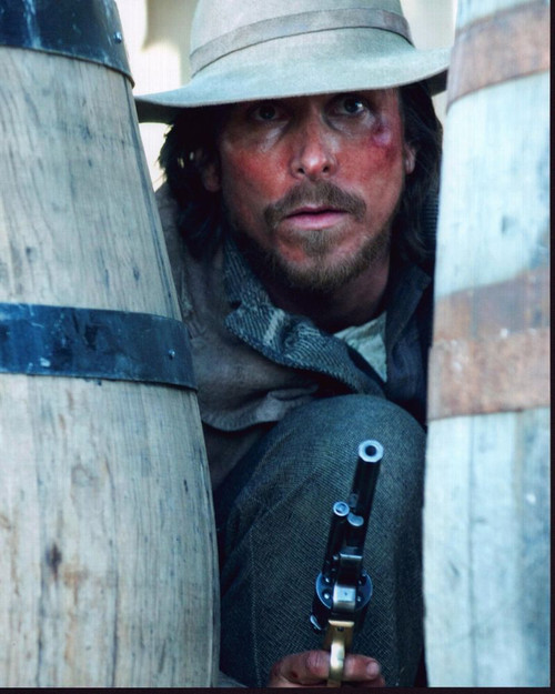 Christian Bale Behind Barrels With Gun In 3:10 To Yuma Photo Print (8 x 10)