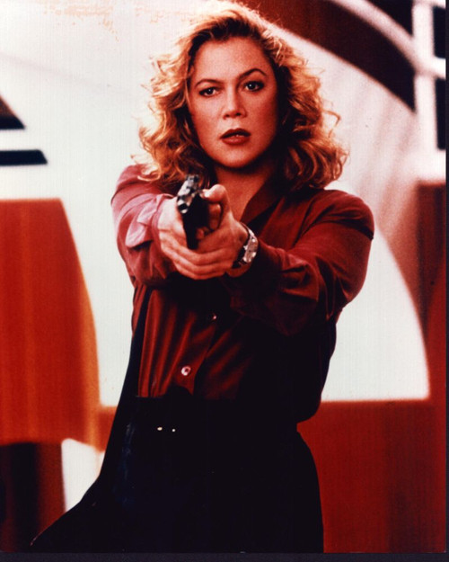 Kathleen Turner Holding Gun In V.I. Warshawski Photo Print