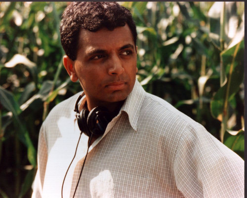 M. Night Shyamalan On Set Of Signs Photo Print (8 x 10)