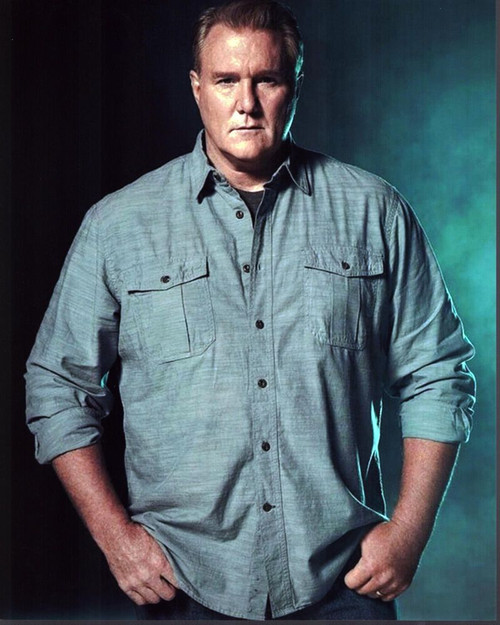 Michael Mcgrady In Gray Shirt And Green Background Photo Print
