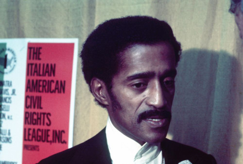 Sammy Davis Jr. at the The Italian American Civil Rights League, circa 1970s. Photo: Oscar Abolafia (sammydavisjr001) Poster