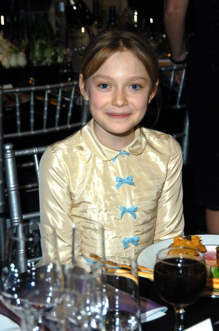 Dakota Fanning at the 12th Annual SAG Awards, Shrine Auditorium, Los Angeles, CA Jan 29, 2006. ph: Ron Wolfson / (Dakota Fanning308) Poster