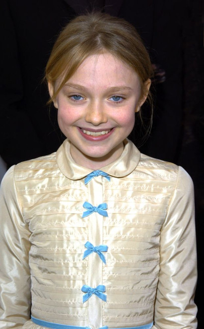 Dakota Fanning arriving at the 12th Annual SAG Awards, Shrine Auditorium, Los Angeles, CA Jan 29, 2006. ph: Ron Wolfson / (Dakota Fanning304) Poster