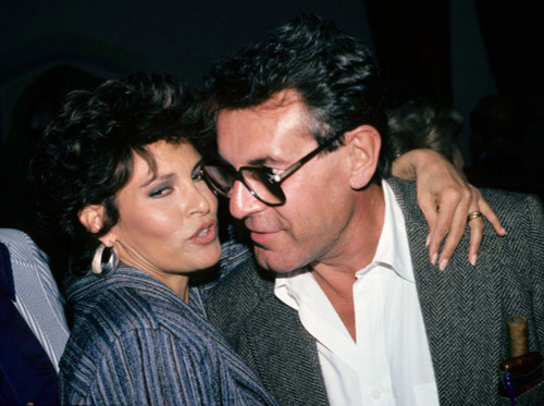 Raquel Welch & Milos Forman 1980s. Photo by Adam Scull (Raquel Welch3627) Poster