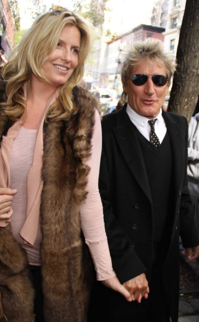 New York, NY 10-19-10, Rod Stewart and wife Penny Lancaster whom is pregnant leaving Nello's Restaurant.Photo by John Barrett (Rod Stewart Penny Lancaster0404) Poster