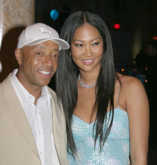 Russell Simmons and Kimora Lee Simmonsat the second annualArt For Life benefit at Mar A Lago for the Rush PhilanthropicArts Foundation, Palm Beach, FL April 8, 2006.Photo by JR Davis (Russell Simmons5607) Poster