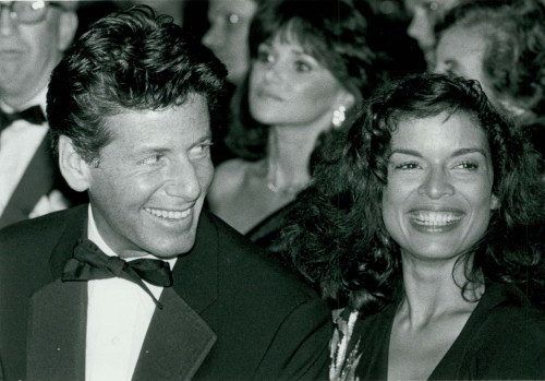 Calvin Klein, Bianca Jagger 1977 at Studio 54. Photo by Adam Scull (Calvin Klein Bianca Jagger9148) Poster