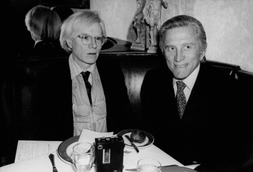 Andy Warhol, Kirk Douglas. 1980s Photo by Adam Scull (Andy Warhol Kirk Douglas07359) Poster