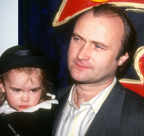 Phil Collins and daughter 1991. Photo By John Barrett (Phil Collins10831) Poster