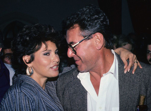 Raquel Welch & Milos Forman 1980s. Photo by Adam Scull (Welch Forman3646) Poster