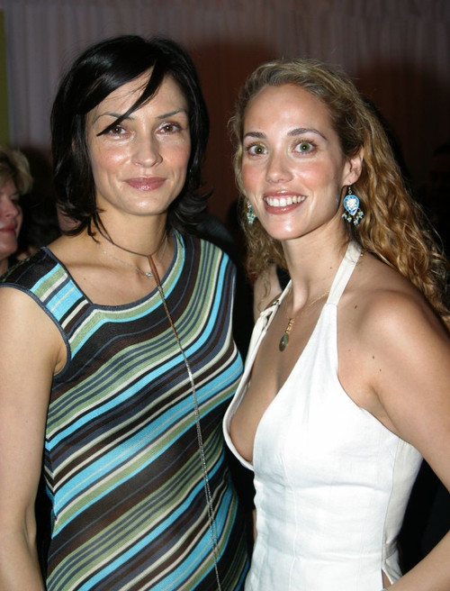 Miami Beach, FL 12-5-2002. Famke Jannsen and Elizabeth Berkely at a private party for Art Basel. Photo By Adam Scull (Jannsen Berkely8945) Poster