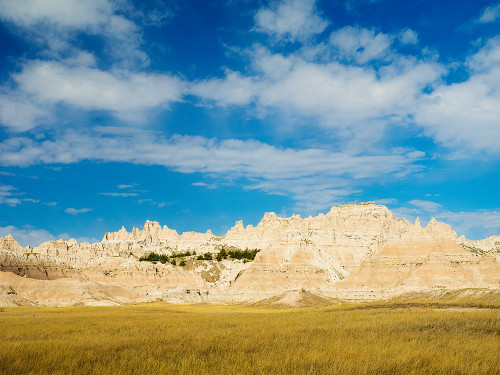 South Dakota- Badlands National Park. Mixed-grass Prairie and Badlands rock formations Poster Print - Jamie and Wild