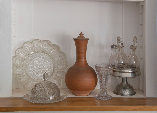 Old glass and serving ware in a ghost town. Poster Print - Betty Sederquist