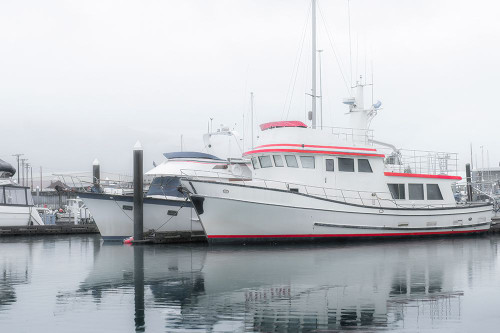 Alaska- Valdez. Two fishing boat in a foggy marina. Poster Print - Janet Muir