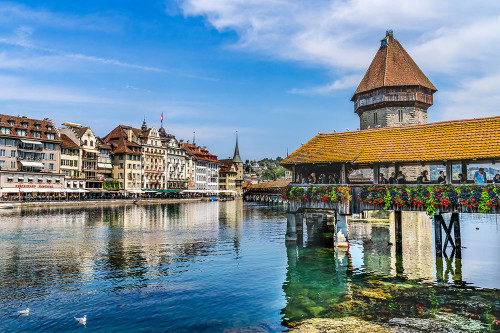 Kapellbrucke over Reuss River-Lucerne-Switzerland. Built in 1365 almost burned down in 1993. Poster Print - William Perry