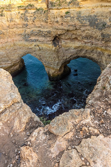 Portugal. Heart-shaped rock design on shore. Poster Print - Gallery Jaynes