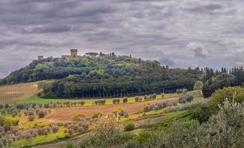 Tuscan landscape under dark skies-Tuscany-Italy. Poster Print - Tom Norring