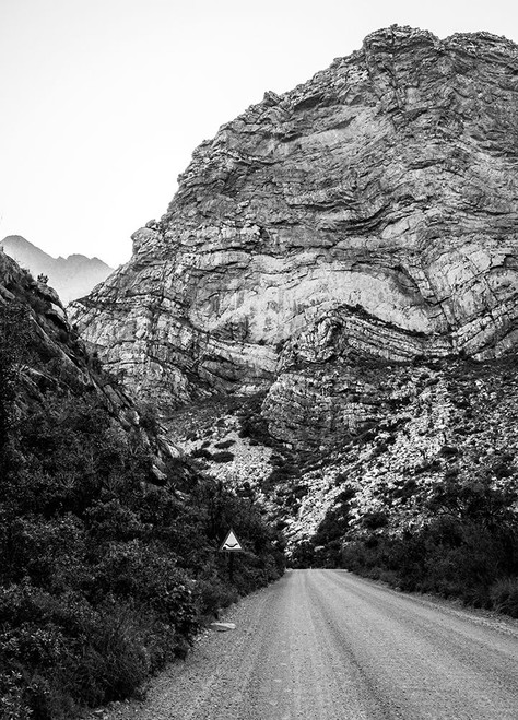 Black and White Road between the mountains Poster Print - Claudi Lourens
